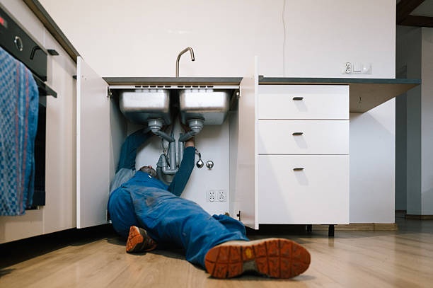 Professional Plumbing technician working in Tennent, NJ